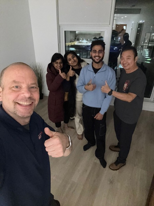 Shane Ballard with a family of homebuyers