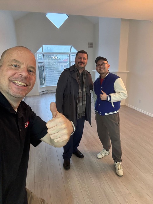 Shane Ballard with new homeowners