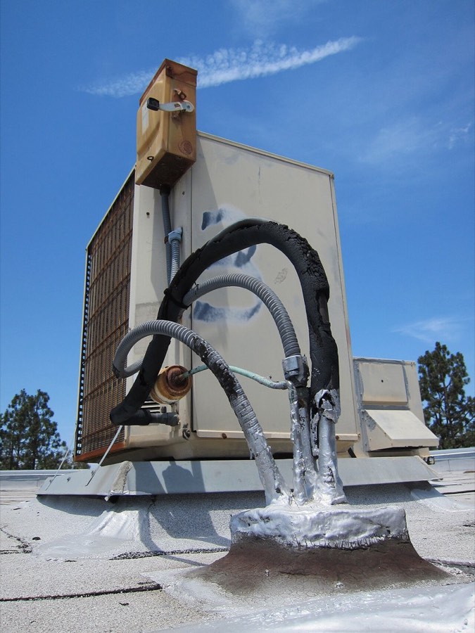 Aging outdoor air conditioning condenser unit